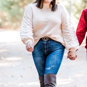 Textured sleeve sweater